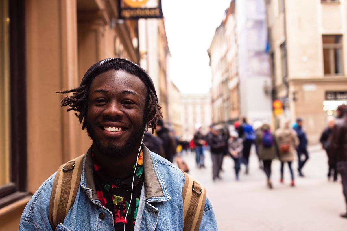 a college student smiling for a photo