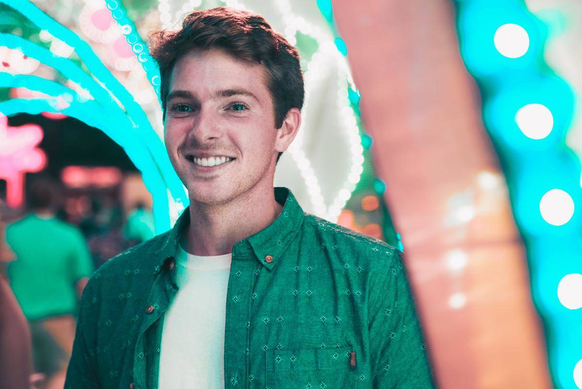 young man smiling for a photo