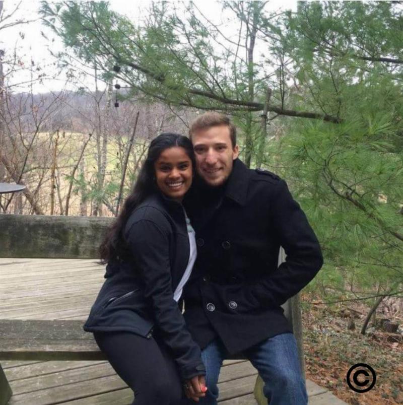 couples sitting on a bench