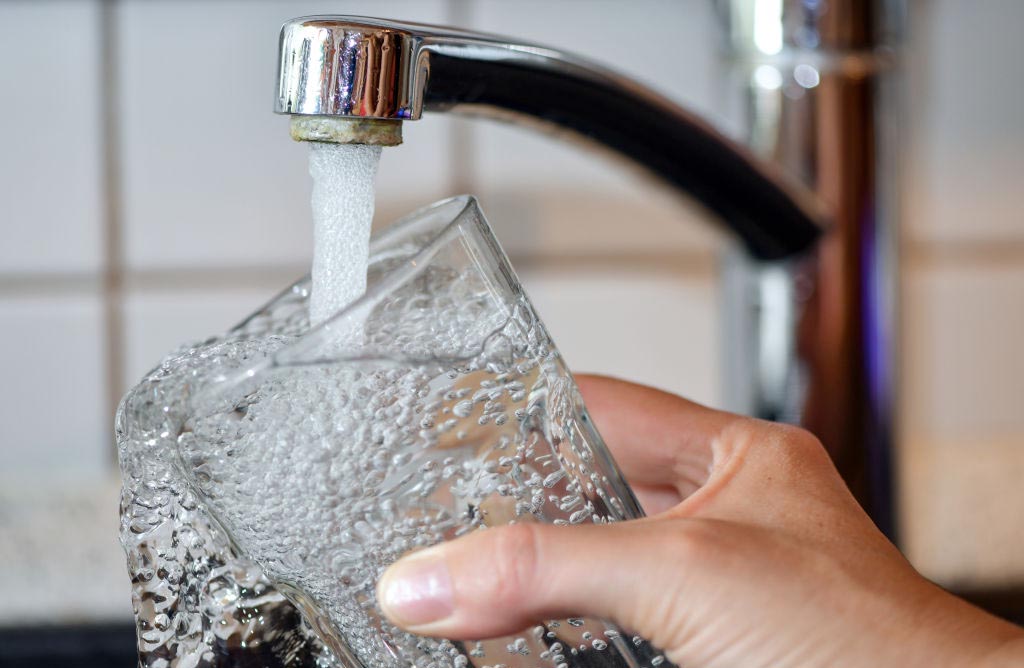 Water into a cup