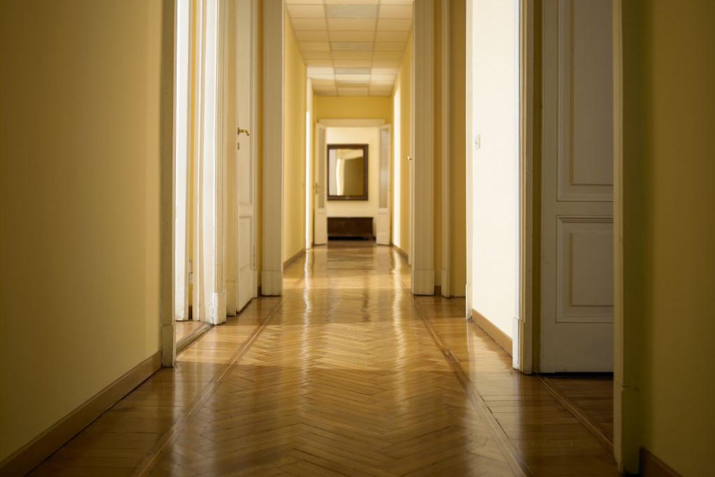 Hallway with hardwood floors